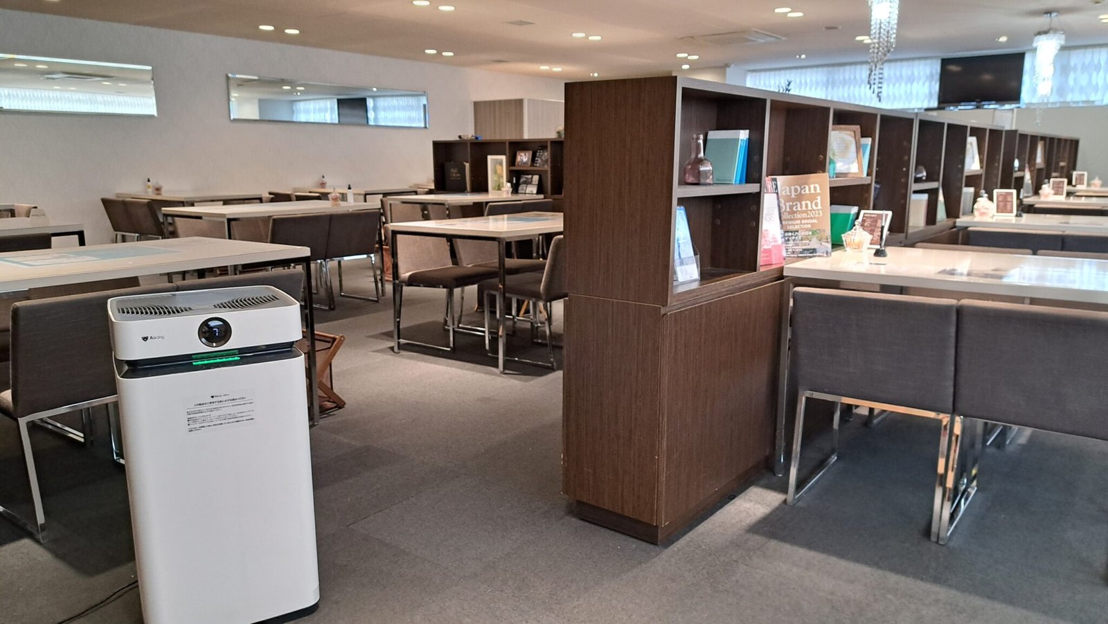 Airdog air purifier in a hotel lounge and dining area