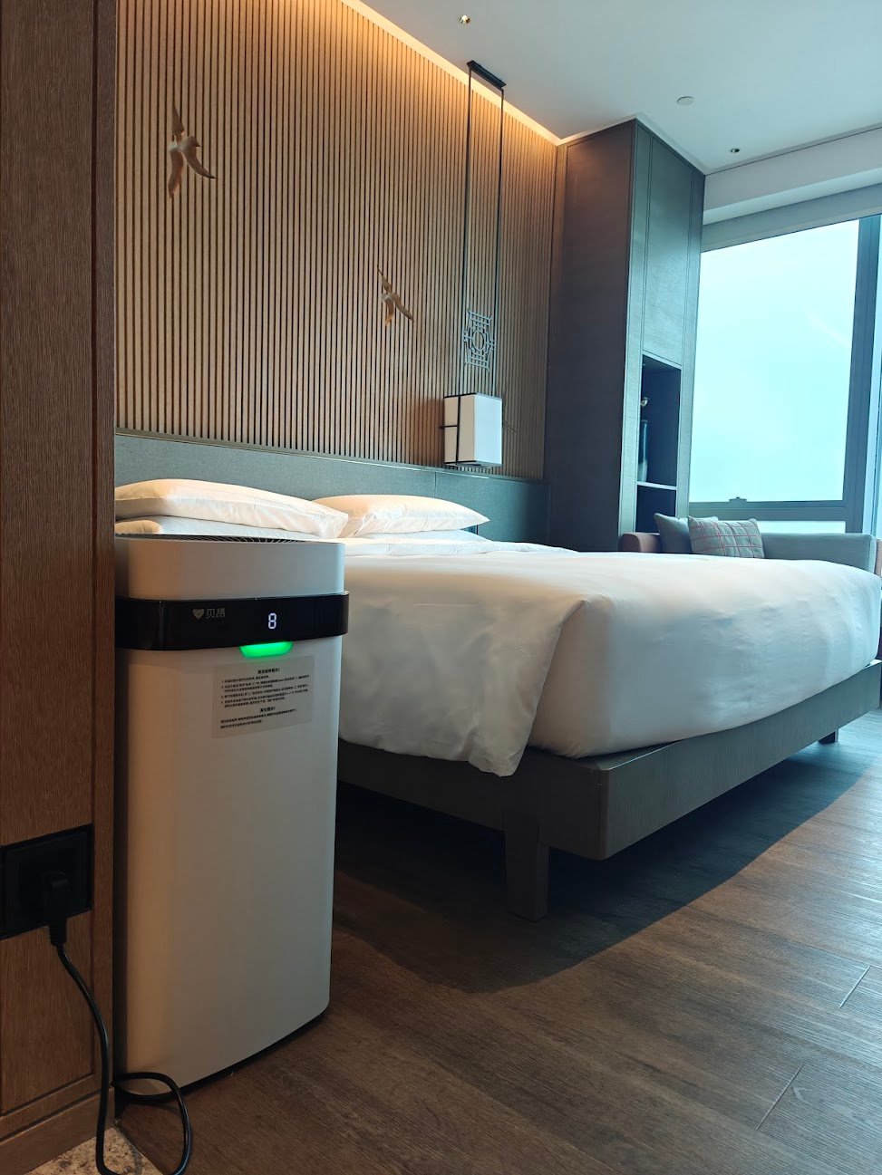 Airdog air purifier in a luxury hotel room